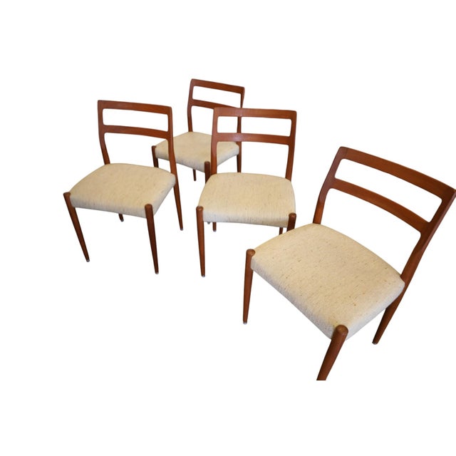 An elegant set of four chairs in golden brown teak, designed by Henning Kjærnulf for KS Møbler in Denmark. with its soft...