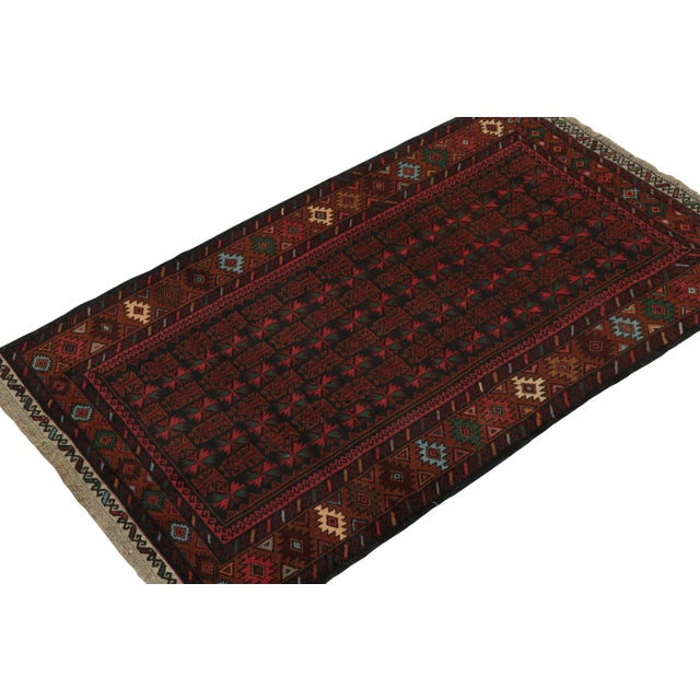 Hand knotted in wool, this 4x6 Baluch rug represents a new line of tribal carpets in the Modern Classics Collection by Rug...