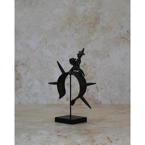 Discover the Benin Bronze Bangle Elevate your space with the Benin Bronze Bangle , a captivating piece of African art that...