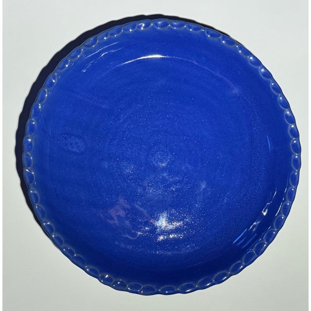 Bring a piece of American ceramic history into your kitchen with this stunning, vintage & unused Bybee Pottery pie plate....