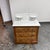 Design Plus Gallery presents an Antique Oak Washstand with Marble Top and Backsplash. This traditional piece is...