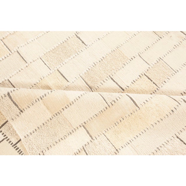 Contemporary textural wool, silk and leather rug by Doris Leslie Blau. Size: 12'1" × 15'1" (368 × 459 cm) A hand-made...