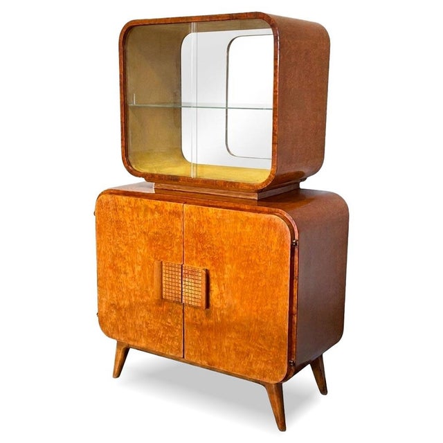 Design: Jindřich Halabala, Manufacturer: UP Závody in Brno, Restored. This display cabinet combines aesthetics and...
