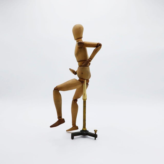 Circa 1940. We offer this Antique Articulate Artist's Mannequin made in wood and brass tripod.