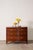 19th-century Victorian mahogany bowfront chest with four graduated drawers, cast brass urn hardware, and a warm aged...