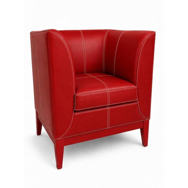 Cub armchair in leather and wood by christophe perichon. Dimensions: w 75 x d 65 x h 80 cm. Materials: leather and wood....