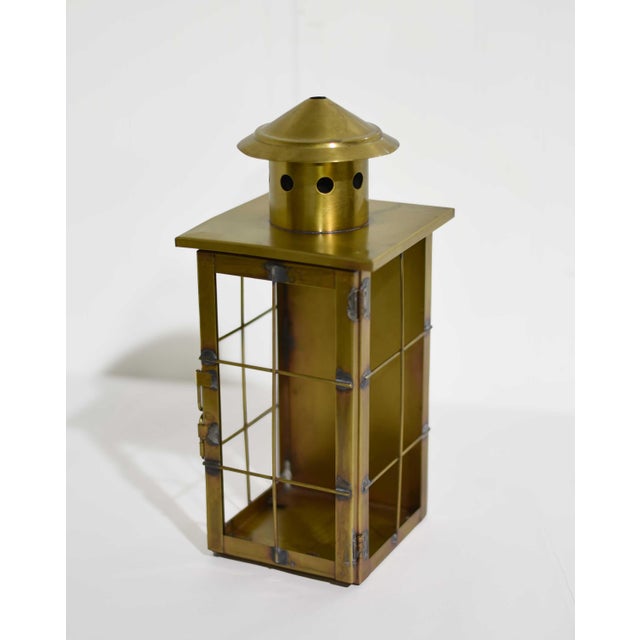 Sculptural and full of character, this pair of vintage handcrafted metal lanterns brings warmth, texture, and an old-world...