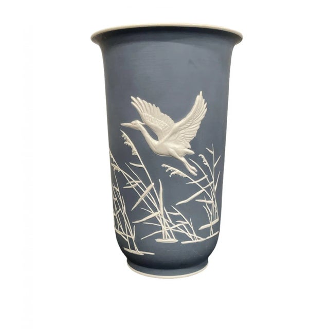 Porcelain Heron vase, light blue-colored ground with white relief decoration depicting herons in water. Green mark, from...