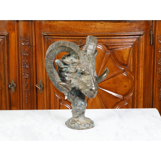 An Italian cast bronze sculpture from the mid 20th century, depicting a ram's head. Created in Italy during the Midcentury...