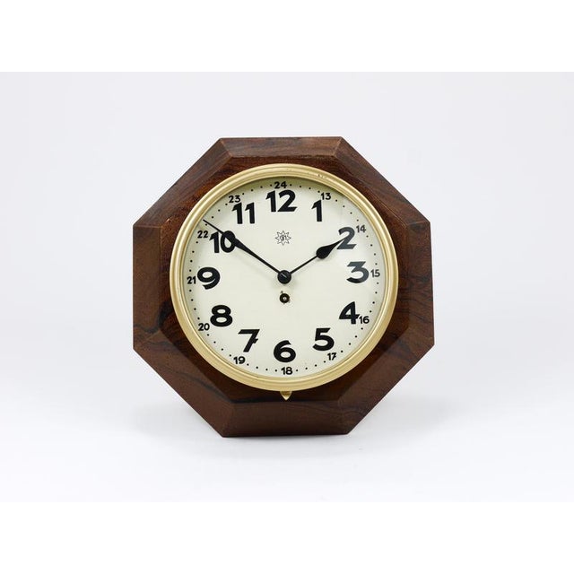 A beautiful minimalist wall clock, dating back to around 1920, designed by Adolf Loos (1870–1933), manufactured by...