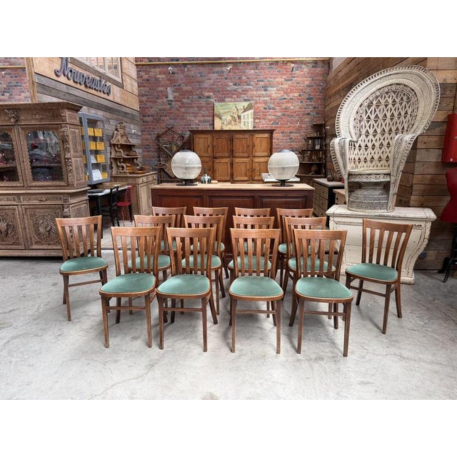 These 14 beechwood bistro chairs still have their original green velvet seats (shows normal wear and tear; see photos)....
