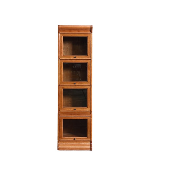 The Mission Narrow Barrister Bookcase - Beveled Glass is a beautifully crafted piece of Mission-style furniture, perfect...