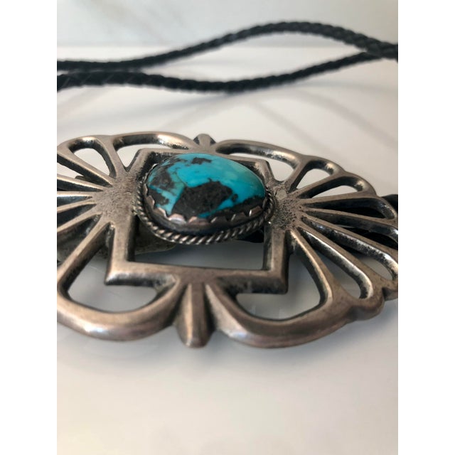 This beautiful 1960s Native American Turquoise Silver Bolo Tie will be a fabulous addition to your vintage jewelry...