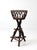 Vintage Adirondack twig plant stand featuring an open lattice basket, twisted branch supports, and a sculptural tripod...