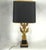 Empire style sculptural table lamp feauturing a sitting eagle with its wings on show, candelabra mounted on a black...