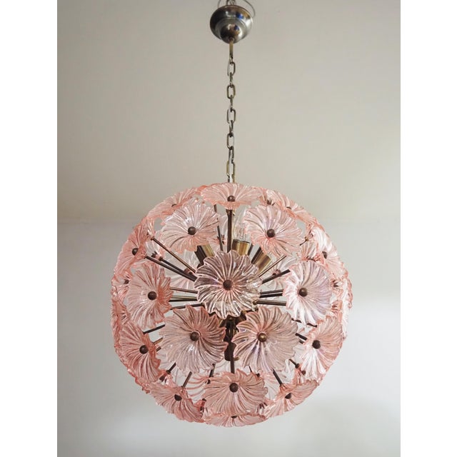 Sputnik space age Italian vintage crystal chandelier made by 51 pink glasses in a burnished brass metal frame. Elegant...