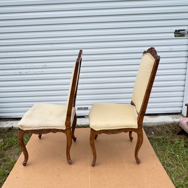 These magnificent chairs represent the pinnacle of 18th-century French furniture craftsmanship, executed in the Louis XV...
