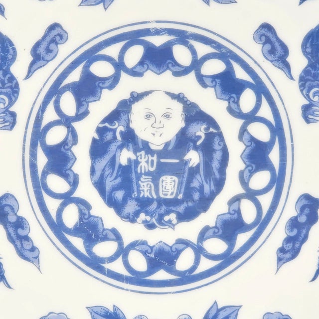 In cobalt and cream, this porcelain tableau spills with memory—children mid-laughter, rooftops tucked into hills, a kite...