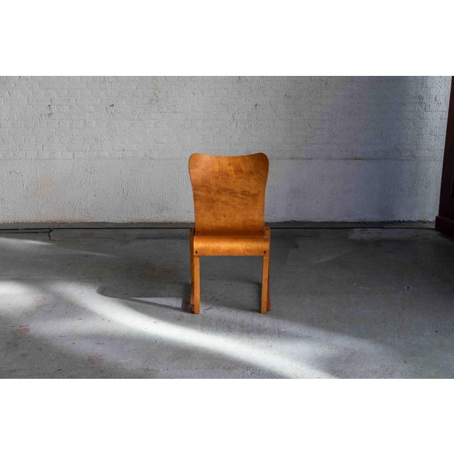 This set of 6 birch dining chairs was designed by Axel Larsson during the 1950’s and produced by Svängsta Stilmöble in...