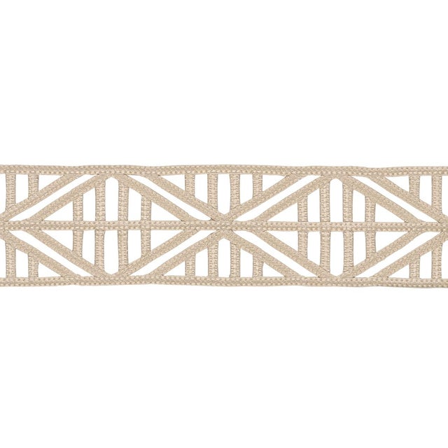 Diamond Lattice is a unique openwork trim that enhances solid and patterned fabrics, adding a stylish geometric touch to...