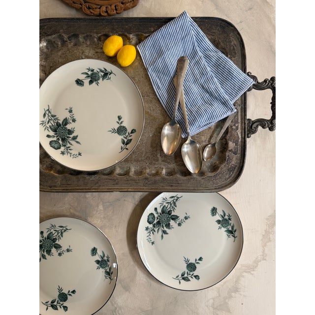 A refined set of three Pickard dinner plates in the Ravenswood pattern. This design features deep green floral clusters...