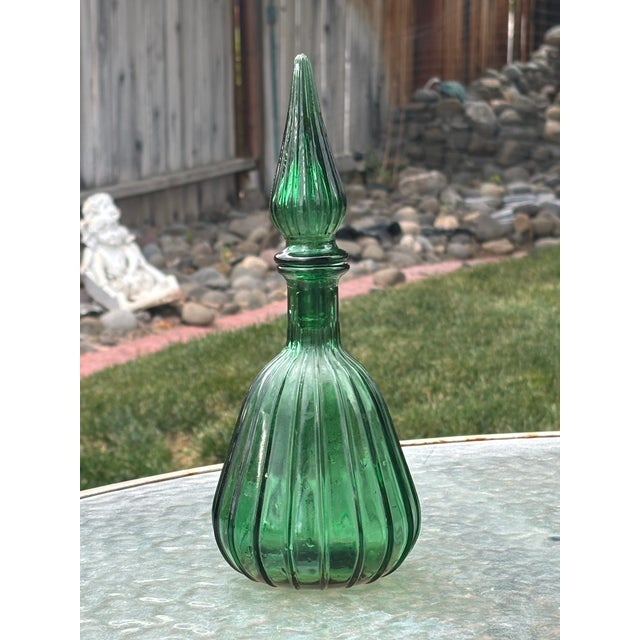Small Empoli Green Ribbed Bottle. This bottle is in great condition, dates to the 1960's, and is from Italy. They look...