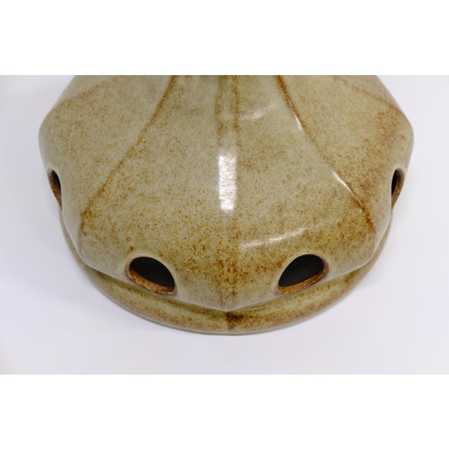 A sculptural ceramic pendant light from the 1960s, in the "Fat Lava" glaze style popular in West German studio pottery of...