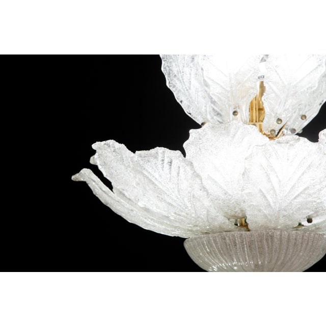 Splendid Murano glass ceiling lamp. Period: circa 1970. The light mounts 12 standard European e14 lamp holders. Perfect...