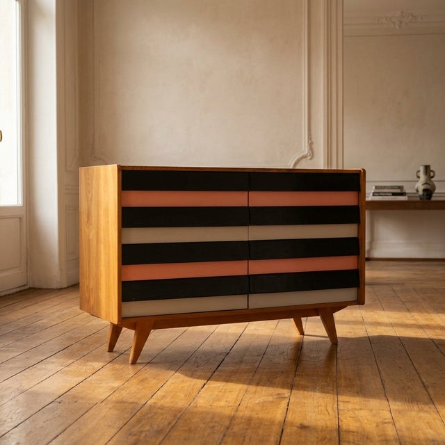 A distinctive vintage czech chest of drawers, model u-453, designed by jiří jiroutek and produced by interiér praha in the...