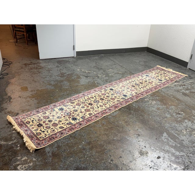 Design Plus Gallery presents a 2ft 6 in × 12ft Persian Style Floral Wool Runner Rug. The elongated runner showcases an...