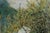A Quiet River - Oil on Canvas Oil painting depicting a river flowing through a grove of trees. Vibrant green trees...