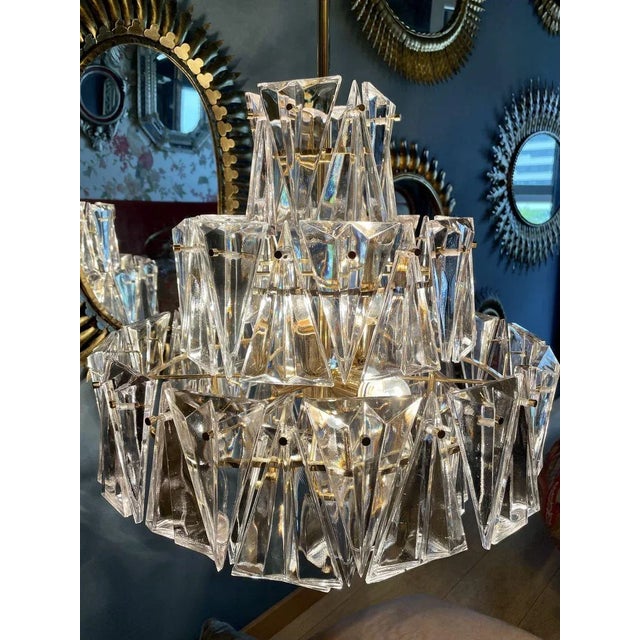 Beautiful, unseen, exclusive lamp, triangular shaped crystals, gold-plated structure, excellent finishes. a luxury...