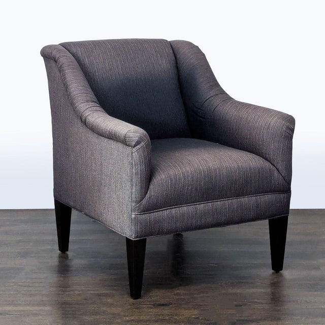 Upgrade your lounge space with this stylish McCreary Modern Lounge Chair. It features a comfortable dark gray fabric,...