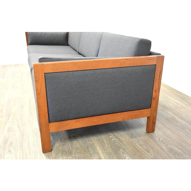 A mid century modern teak grey sofa. Professionally reupholstered 83” wide 32” deep 26” tall Seat height 15”