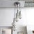 Cascading six globe textured glass chandelier, Germany, 1970, with nickel plated metal fittings (sleeves, caps) suspended...