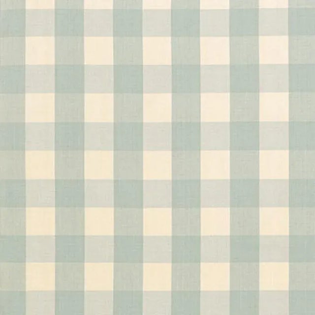 A classic one and a half-inch buffalo check, this woven cotton is a wonderful complement to both prints and plains. Sold...