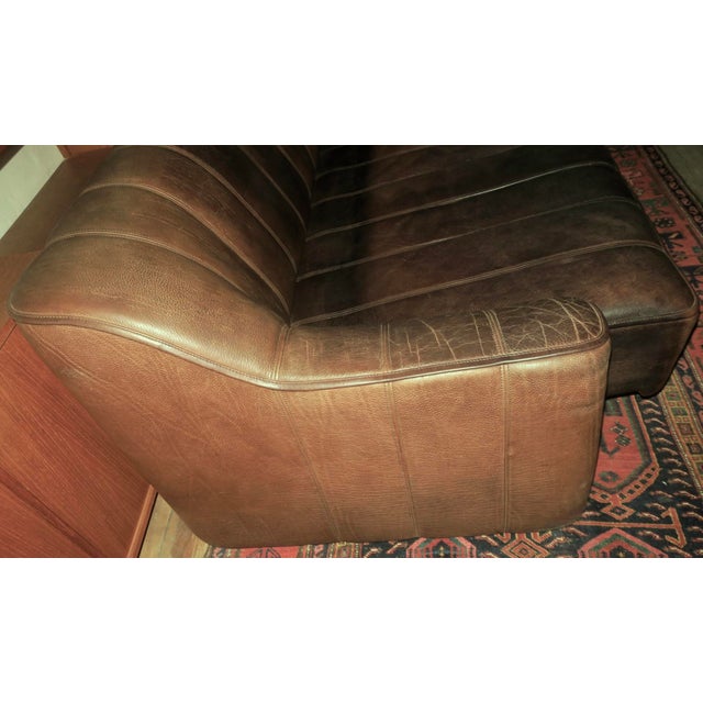 de Sede DS44 3-seater sofa, 1970s. Beautifully patinated high quality Swiss product full of character in chestnut brown...