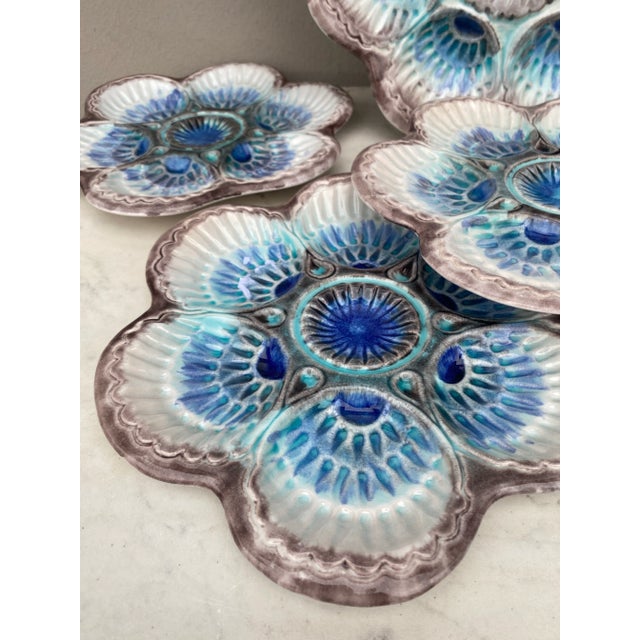 Rare set of 8 Majolica oysters plates and platter signed Marcel Guillot, circa 1950. Very rare color. platter 16.5 inches...