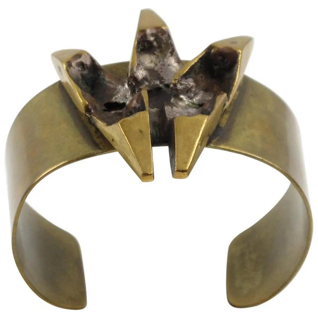 This impressive, sculptural, and brutalist bronze cuff bracelet was designed by French sculptor and painter Henri Nogaret...