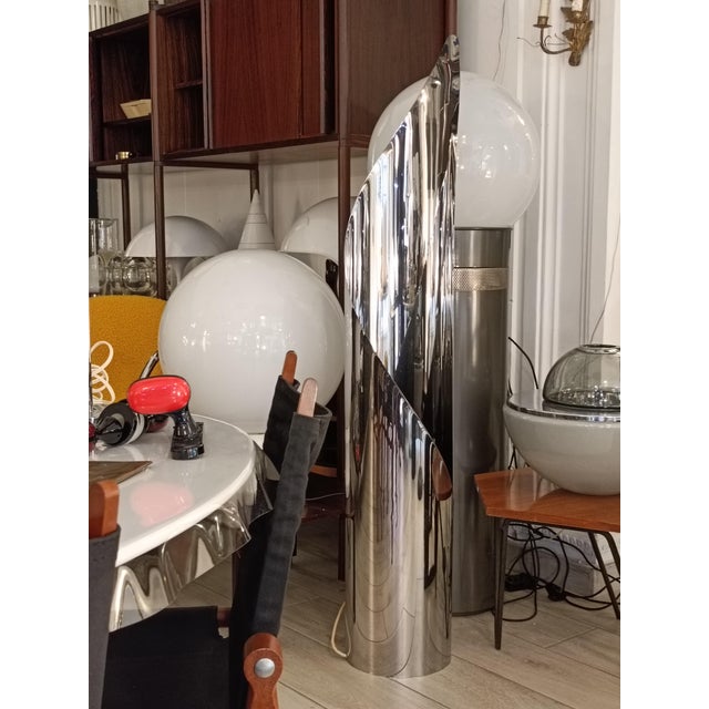 Beautiful sculptural floor lamp made in Italy from a meticulously crafted sheet of metal. This unique piece of metal is...