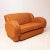 A british art deco suite newly upholstered in a 1930s style orange and gold material the suite has a classic art deco...