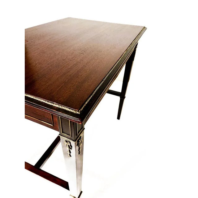 For sale is a restored original Empire desk (1804-1840) in mahogany. The brass applications and the delicate appearance...