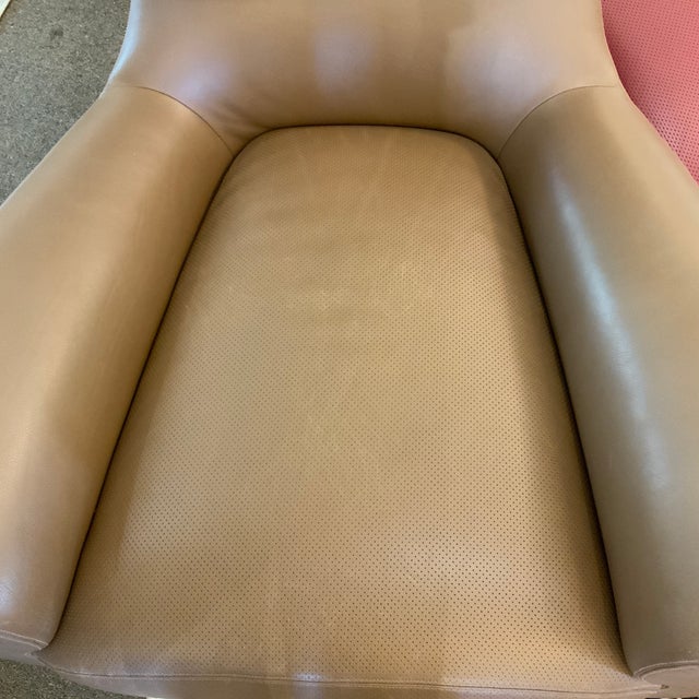 David linley Aston chair in brown leather with perforated seat. Beautiful proportions and a comfortable seat. Please see...