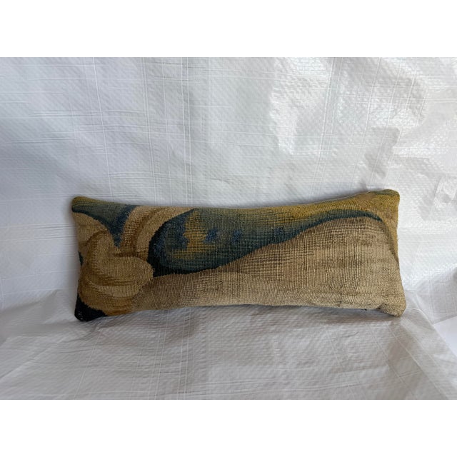 This remarkable 17th-century Brussels tapestry pillow combines historic craftsmanship with an expressive abstract...