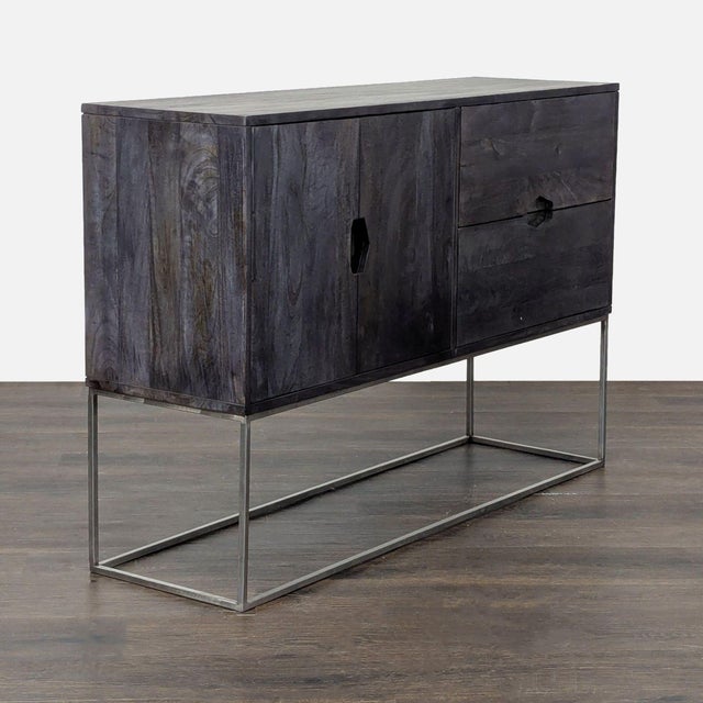 The Smythe media console has plenty of storage space with double drawers, double doors and two inner shelves. It's Crafted...