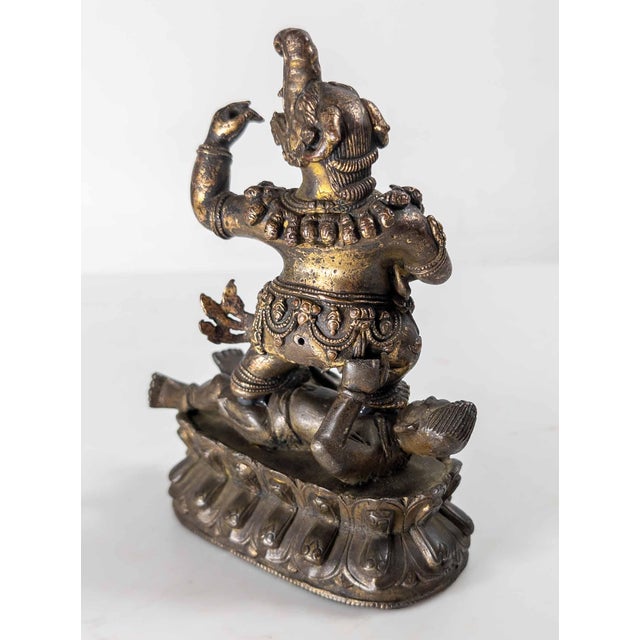 18th Century 17th or 18th Century Chinese Sino-Tibetan Gilt Bronze Buddhist Makala Faced Deity Figure For Sale - Image 5 of 18