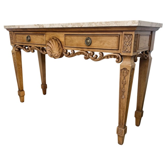 An elegant Neoclassical style console table by Century Furniture featuring a thick, beveled "Genuine Marble" top made in...