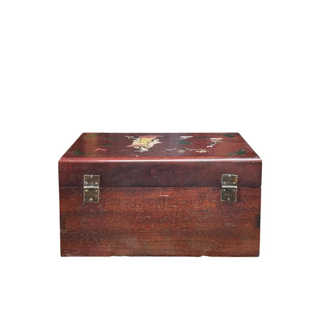 This vintage Chinese wooden storage chest features a rich, reddish-brown finish that highlights the natural grain of the...