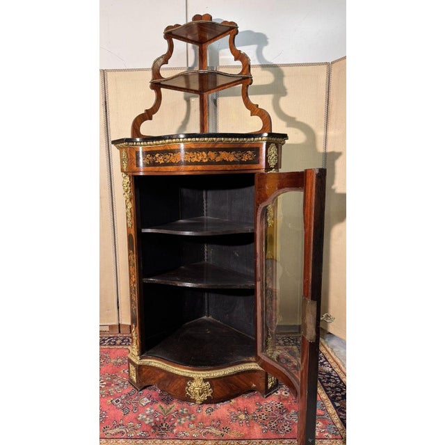 Louis XIV Style Curved Corner Cabinet in Wood and Marquetry One glazed door on the front Abundant gilt bronze mounts Black...