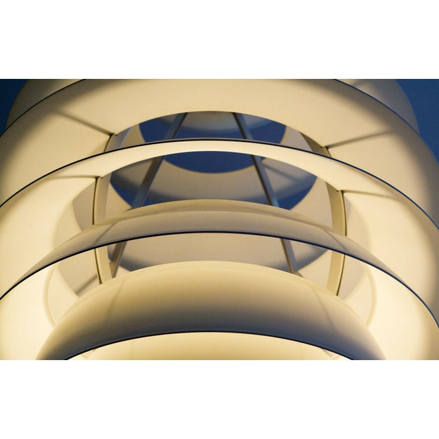 This imposing pendant lamp was originally designed by Poul Henningsen, then later taken over by Kurt Norregaard and...